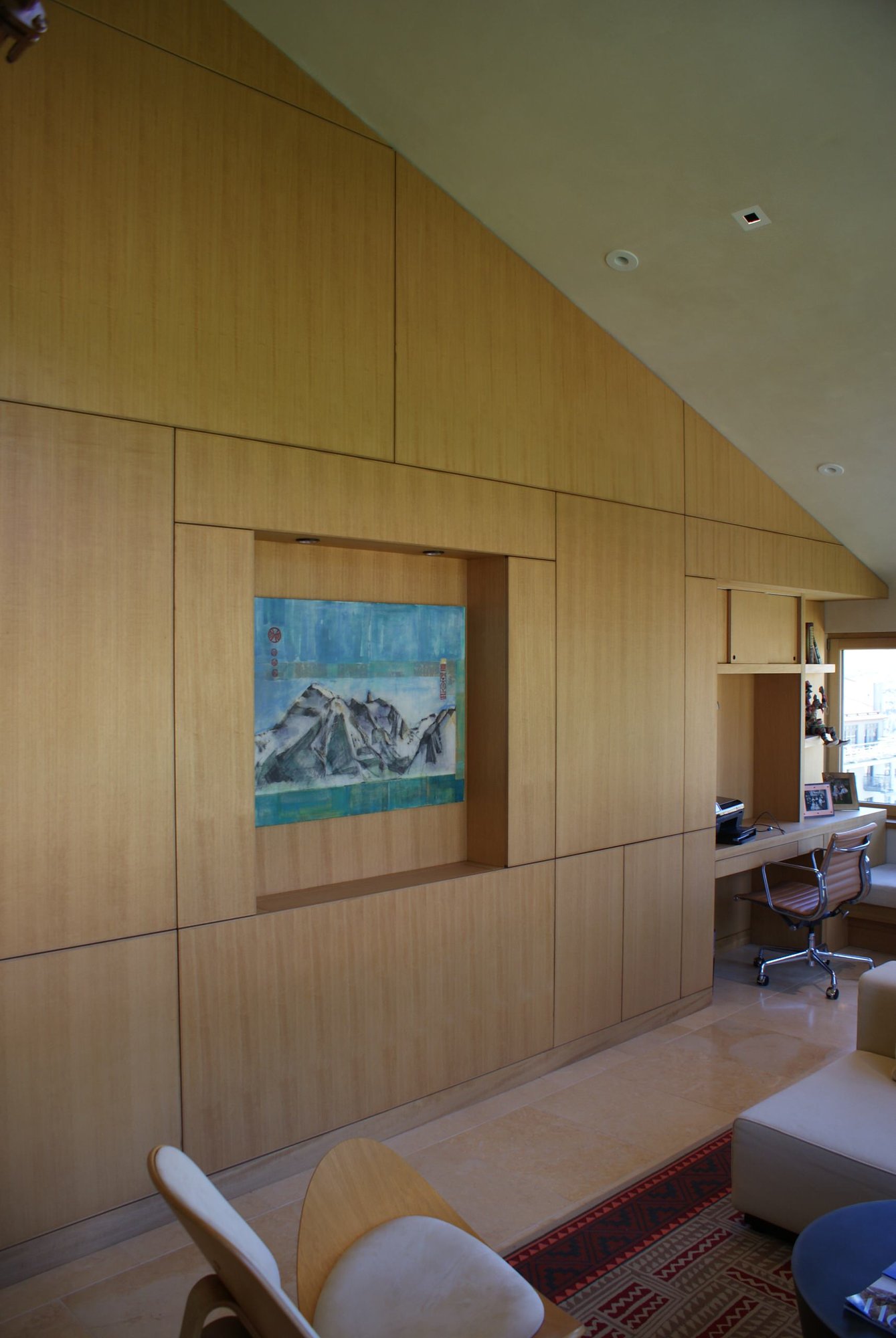 Large minimalist formal and open concept travertine floor living room with beige walls, no fireplace and a media wall, by Jensen Design in Telluride, CO