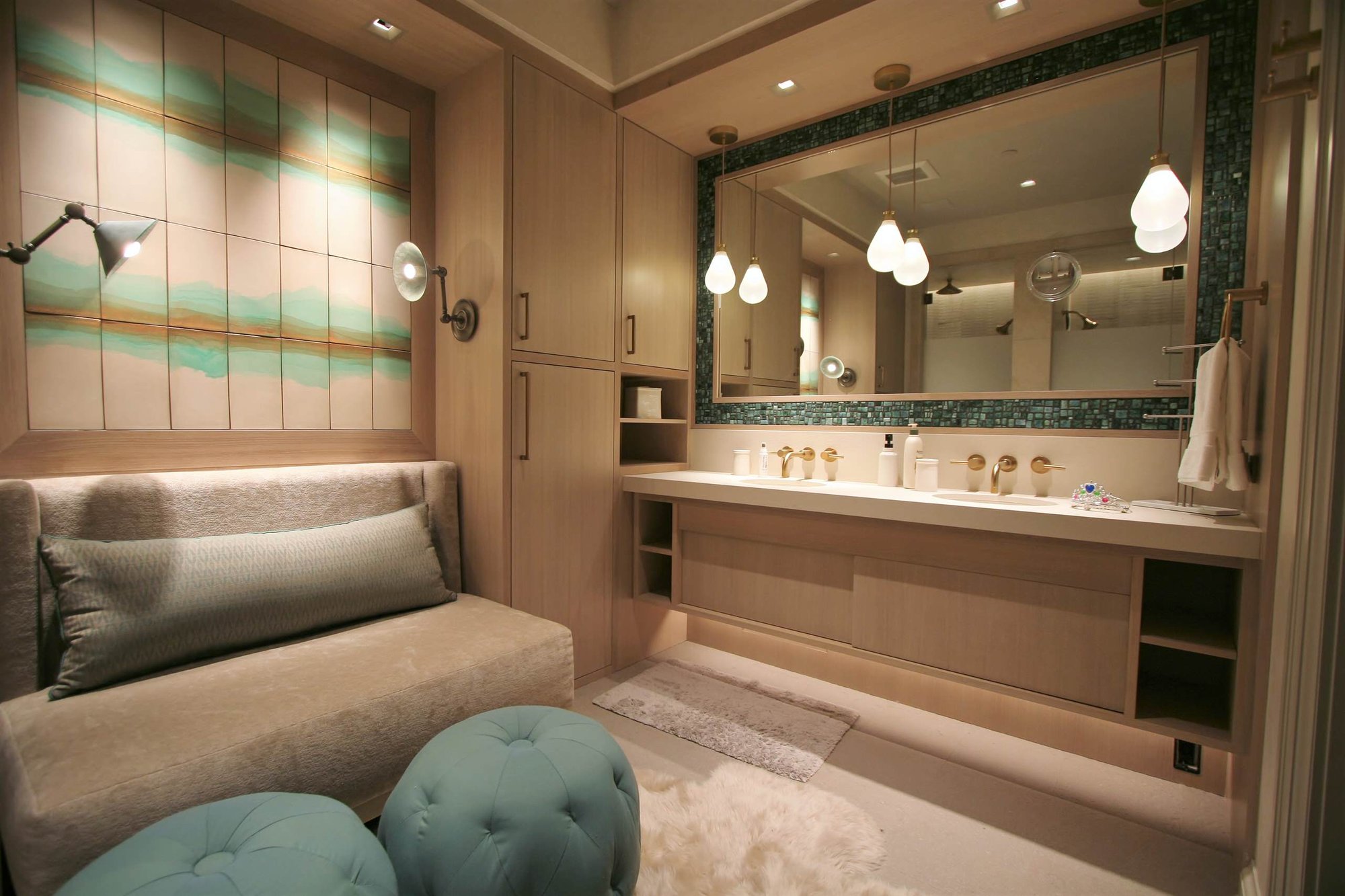 Mid-sized modern master porcelain tile bathroom with flat-panel cabinets, an undermount sink, light wood cabinets, beige walls and solid surface countertops, by Jensen Design in Telluride, CO