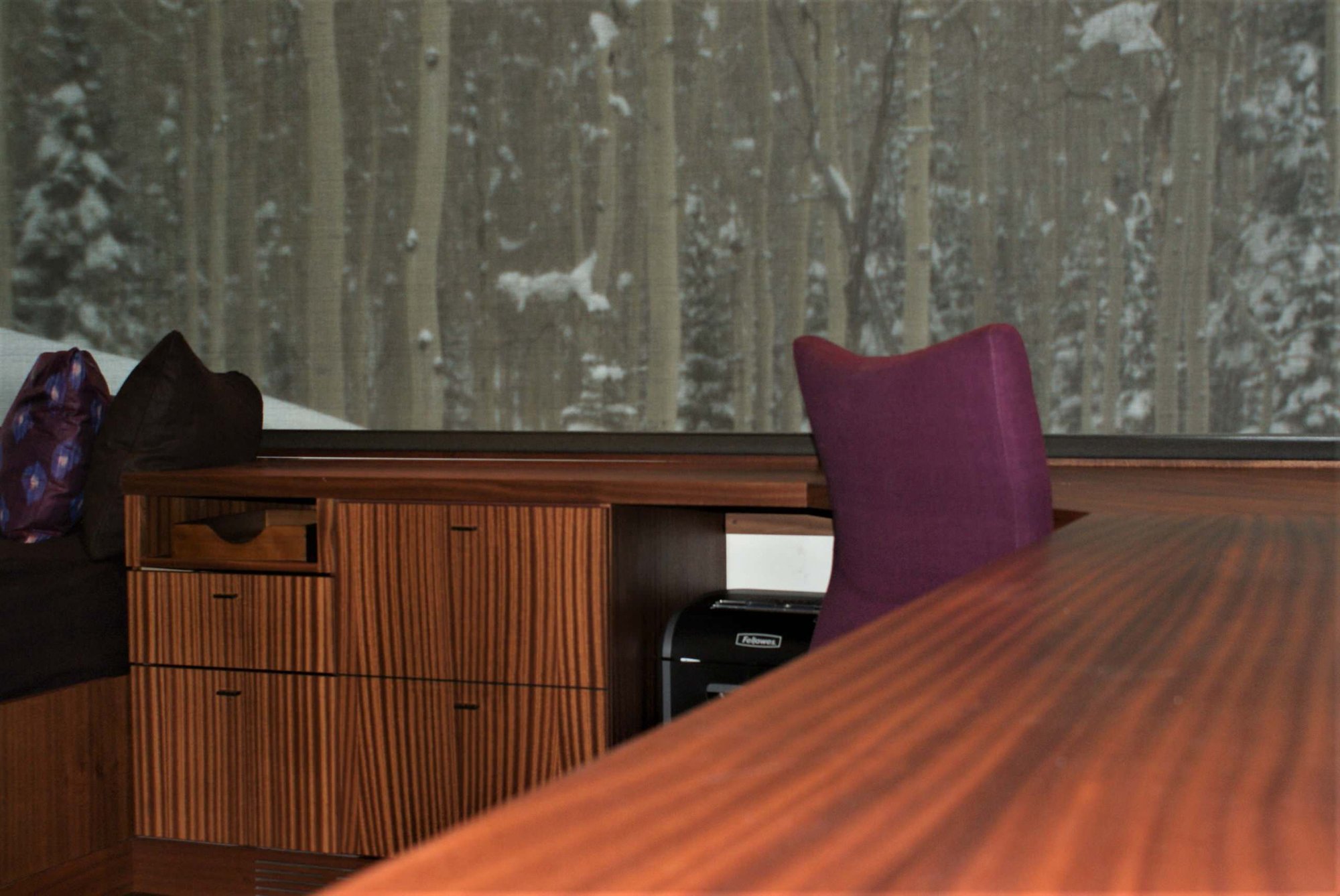 Large contemporary built-in desk dark wood floor study room with white walls, by Jensen Design in Telluride, CO