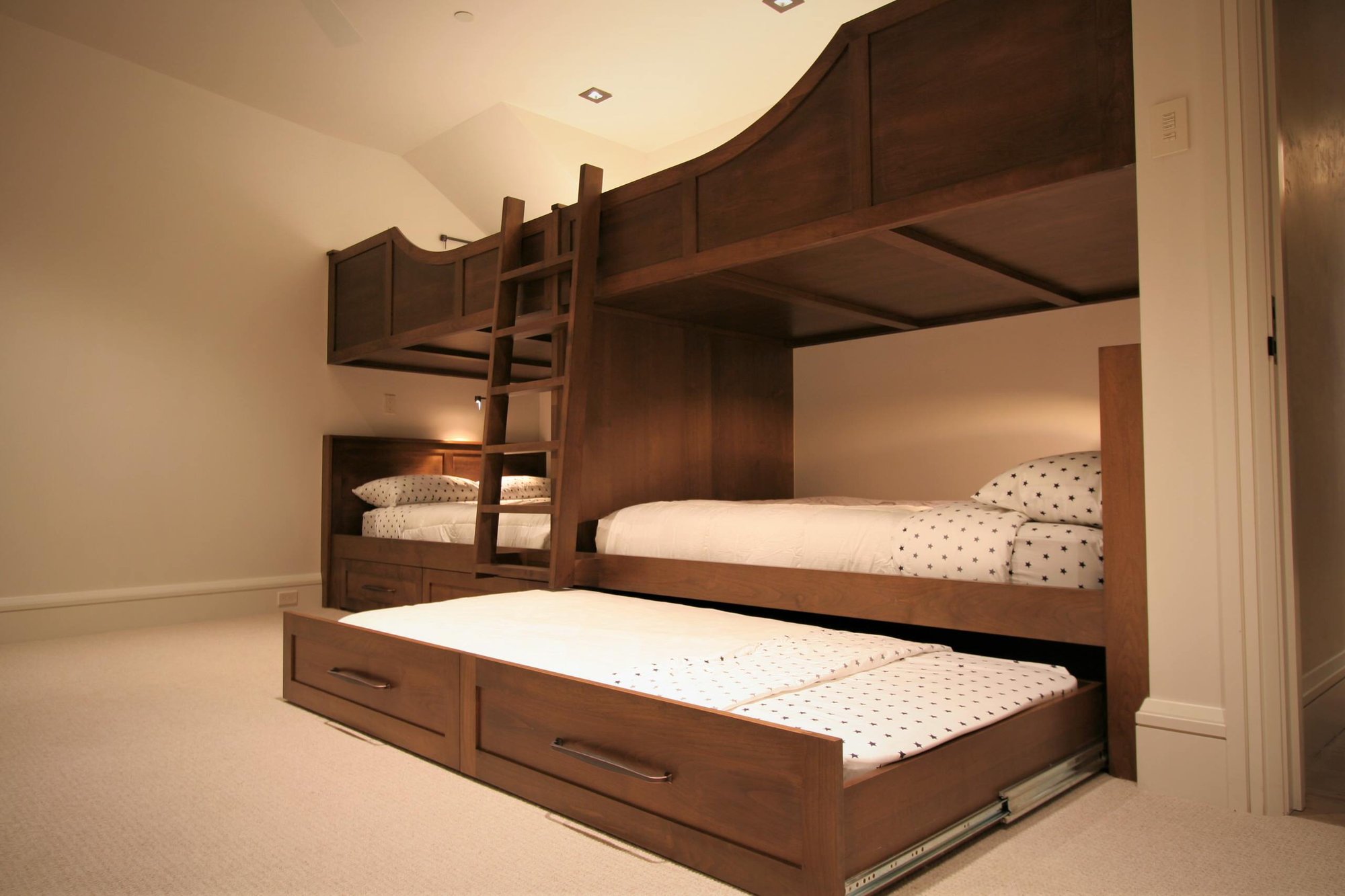 Mid-sized rustic guest carpeted and beige floor bedroom with beige walls and no fireplace, by Jensen Design in Mountain Village, CO