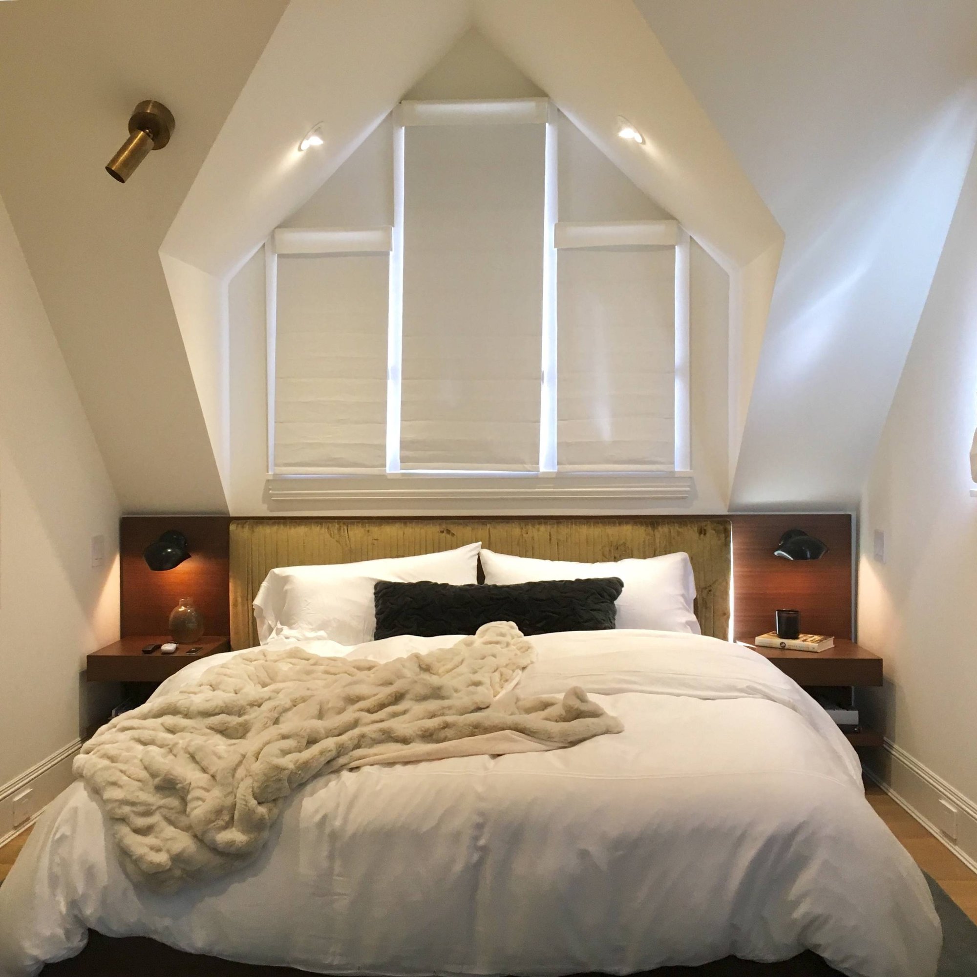 Mid-sized modern master light wood floor bedroom with white walls, by Jensen Design in Telluride, CO
