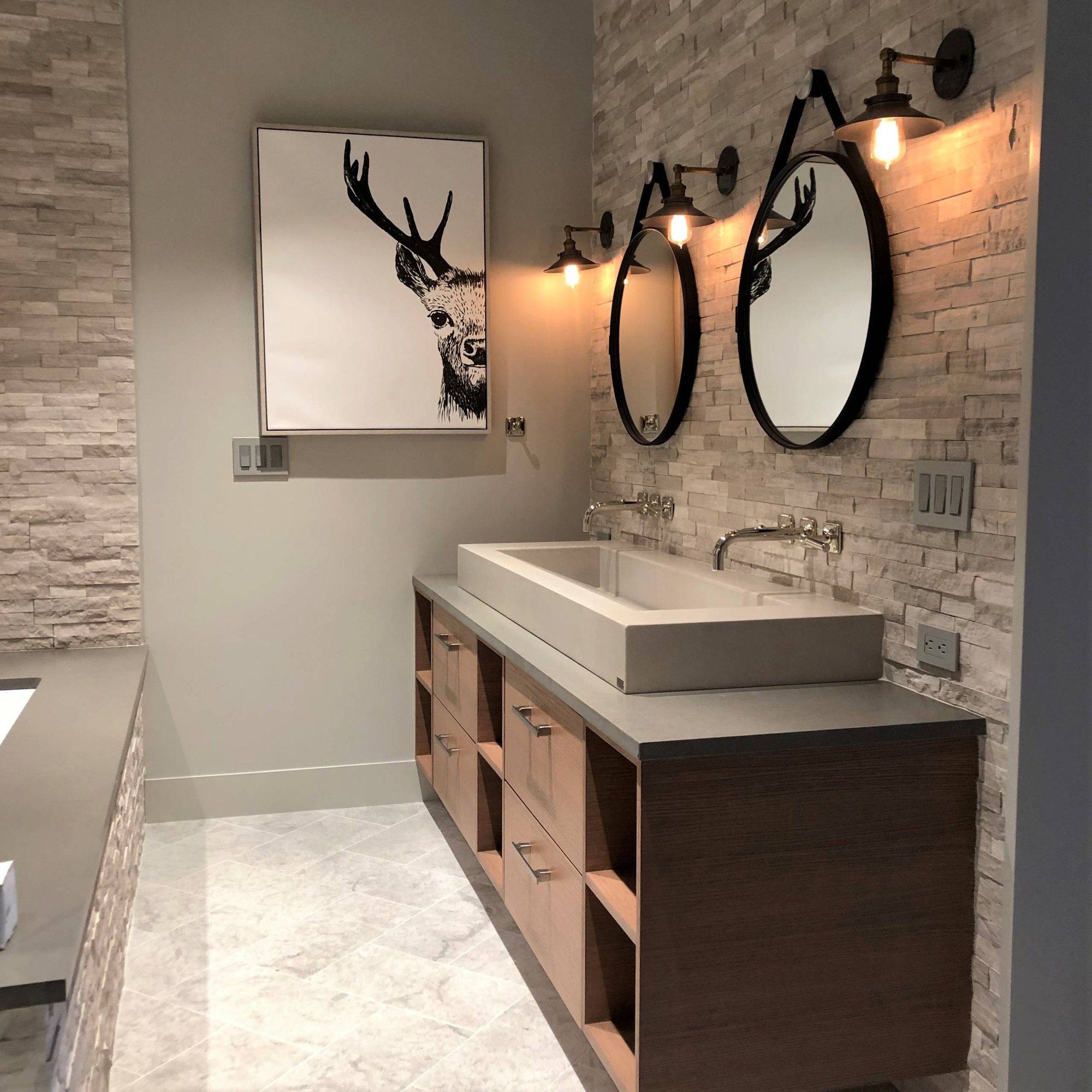 Mid-sized contemporary master gray tile and stone tile marble floor and gray floor bathroom with flat-panel cabinets, medium tone wood cabinets, a two-piece toilet, gray walls, a vessel sink, quartzite countertops and gray countertops, by Jensen Design in Mountain Village, CO