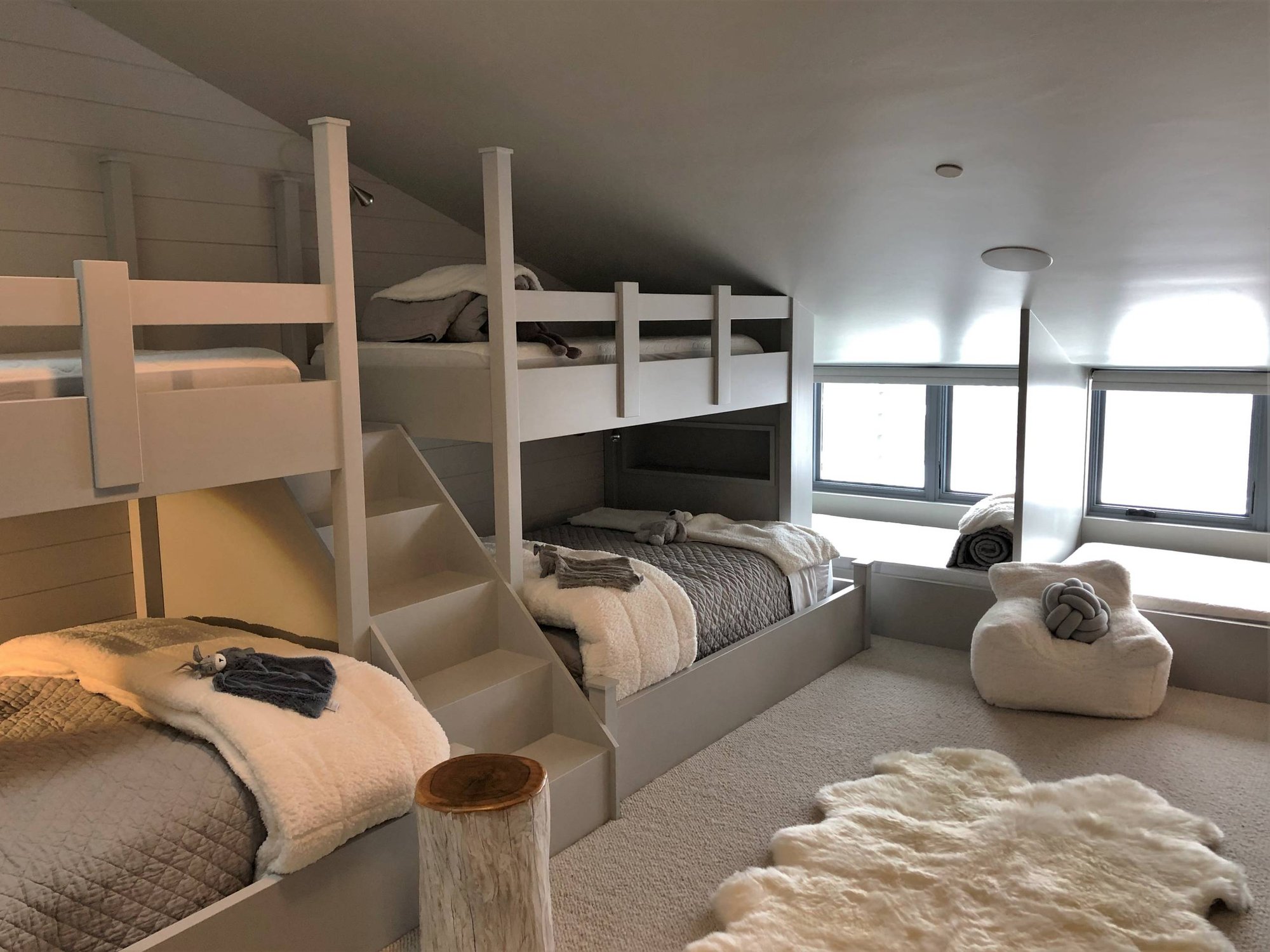 Mid-sized trendy guest carpeted and gray floor bedroom with gray walls and no fireplace, by Jensen Design in Mountain Village, CO