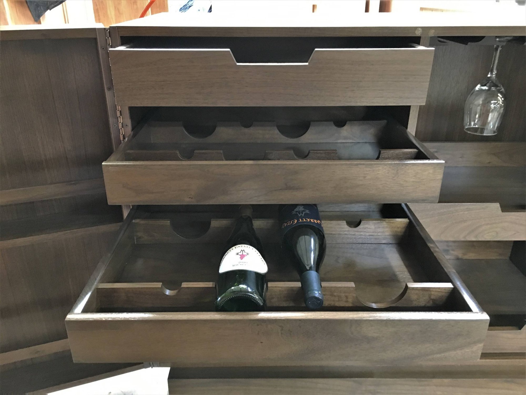 Mid-sized trendy medium tone wood floor wine cellar, by Jensen Design in Telluride, CO