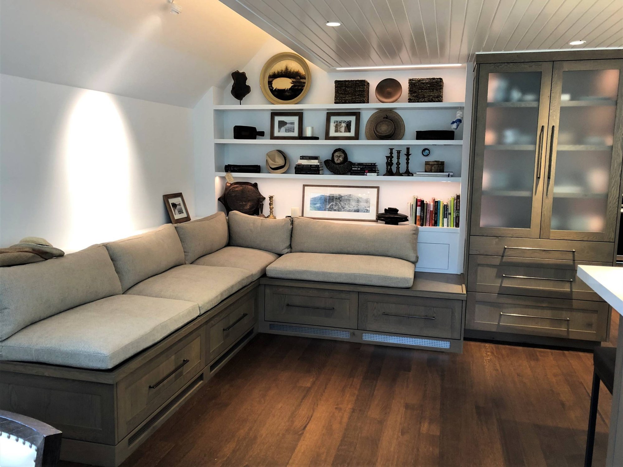 Mid-sized trendy l-shaped dark wood floor and brown floor eat-in kitchen with an undermount sink, flat-panel cabinets, gray cabinets, quartzite countertops, white backsplash, subway tile backsplash, stainless steel appliances, a peninsula and white countertops, by Jensen Design in Telluride, CO