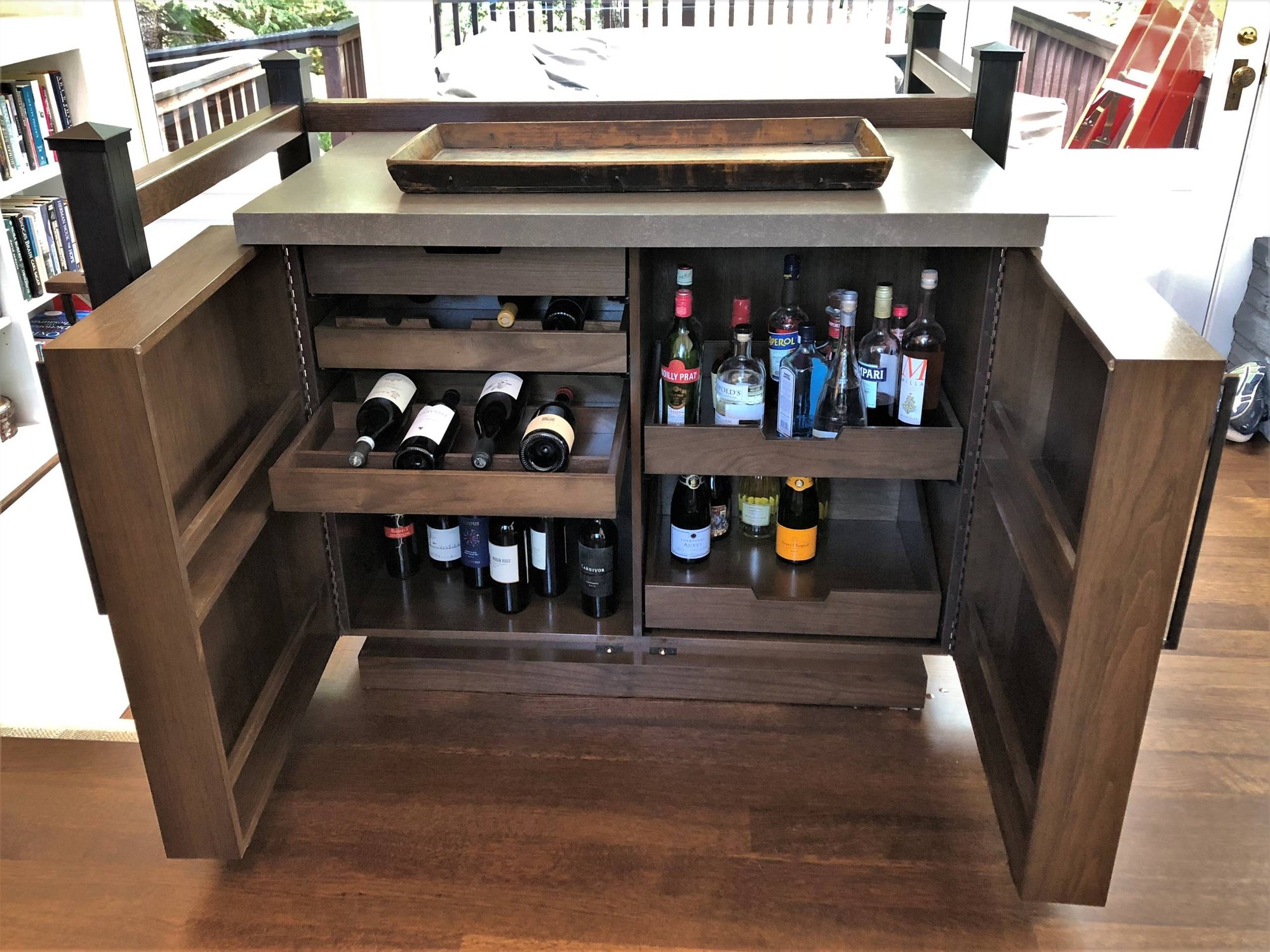 Mid-sized trendy medium tone wood floor wine cellar, by Jensen Design in Telluride, CO