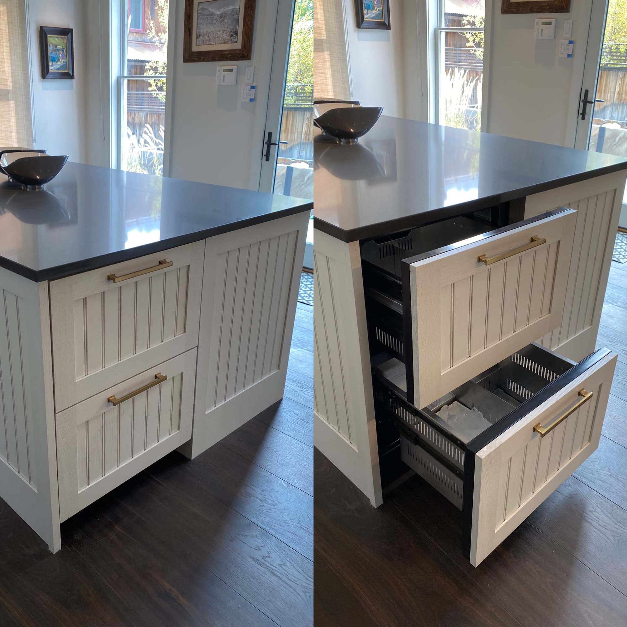 Mid-sized trendy l-shaped dark wood floor, brown floor and vaulted ceiling open concept kitchen with a farmhouse sink, recessed-panel cabinets, white cabinets, white backsplash, paneled appliances and an island, by Jensen Design in Telluride, CO